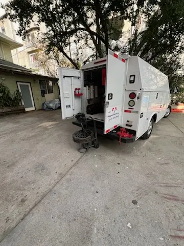 Magnet Plumbing service vehicle on-site for Water Heater Repair in Pacific Palisades